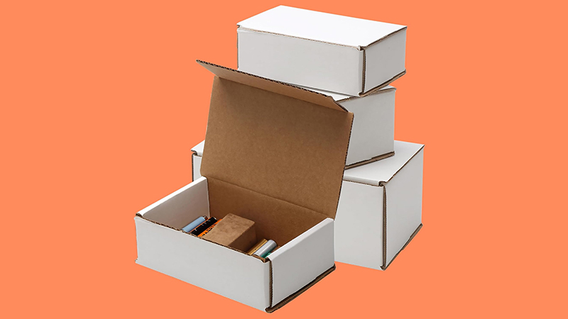 Corrugated shipping mailers measuring 6 by 4 by 2 inches.